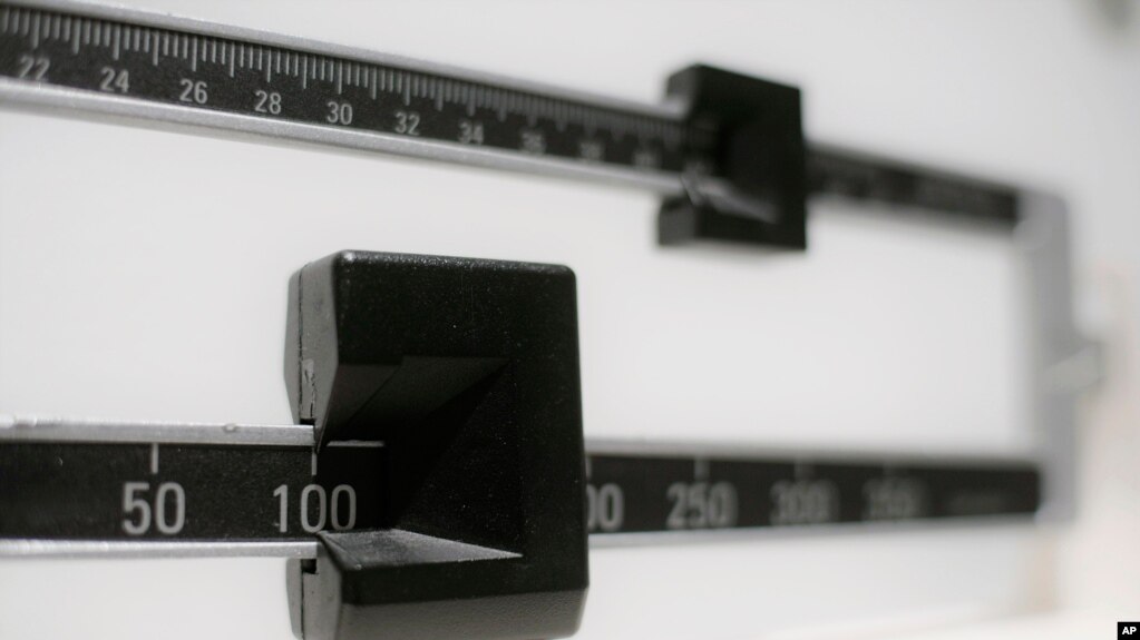 This Tuesday, April 3, 2018 photo shows a closeup of a beam scale in New York. (AP Photo/Patrick Sison)