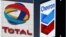 Total နဲ့ Chevron  ကမ္ဘာ့ရေနံကုမ္ပဏီကြီး ၂ ခု (PHOTO: REUTERS) 