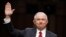 Attorney General Jeff Sessions smiles after being sworn-in on Capitol Hill in Washington, June 13, 2017.