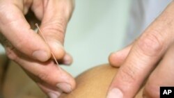 Researchers are closer to unlocking the mysteries of acupuncture, learning more about why the ancient Chinese needle treatment eases pain.