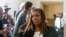 FILE - New York attorney general Letitia James steps out of the courtroom doing a short break in the civil business fraud trial against former President Donald Trump at New York Supreme Court, Monday, Oct. 2, 2023, in New York.
