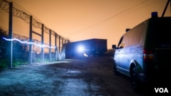 Night shots of the newly erected border fence in Asotthalom, Hungary. (Gabor Ancsin/VOA)