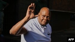 FILE — Zimbabwe former legislator and prominent member of the opposition party Citizens Coalition for Change, CCC Job Sikhala salutes the press and well wishers at the Harare Magistrates Court in Harare on January 24, 2024.