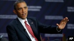 U.S. President Barack Obama answers a question while participating in a forum on Inclusive Economic Growth and Development at the Old Custom House in San Jose, Costa Rica, Saturday, May 4, 2013.