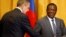 Zimbabwean President Emmerson Mnangagwa greets Russian Foreign Minister Sergey Lavrov before their meeting in Harare, Zimbabwe, March 8, 2018. 