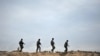 FILE - Somali security forces patrol for militant groups in Puntland, northeastern Somalia, Dec. 18, 2016. For much of January 2025, forces have been advancing on Islamic State hideouts in the region.