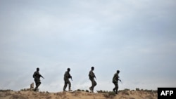 FILE - Somali security forces patrol for militant groups in Puntland, northeastern Somalia, Dec. 18, 2016. For much of January 2025, forces have been advancing on Islamic State hideouts in the region.