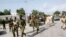FILE - Somali soldiers patrol the streets in Mogadishu.