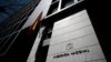 FILE - A Spanish flag waves at the entrance of Spain's High Court in central Madrid, Spain, April 18, 2016. Spanish authorities this week issued arrest warrants for several Russians - some reputedly associates of President Putin - suspected of having ties