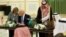 Saudi Arabia's King Salman bin Abdulaziz Al Saud (right) and U.S. President Donald Trump sign a joint security agreement at the Royal Court in Riyadh, Saudi Arabia, May 20, 2017.