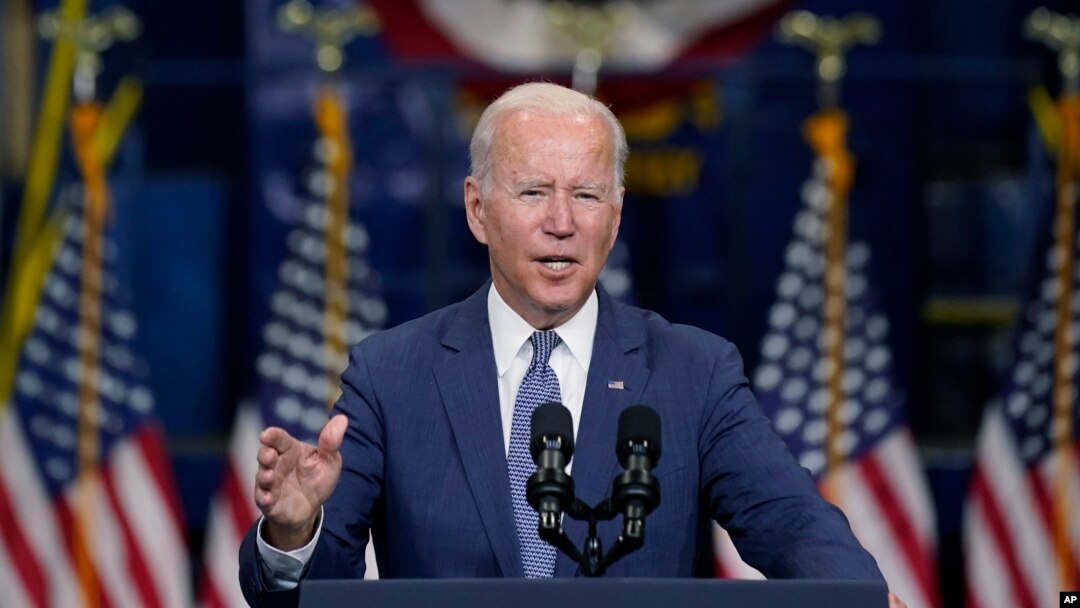 FILE - President Joe Biden speaks at an event in Kearny, New Jersey, Oct. 25, 2021. Biden has promised to show that democracies can work together to meet the challenges of the 21st century. He is now preparing to push that message at a global virtual summit.