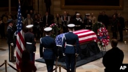 The last visitors pay respects to the late president, George H.W. Bush, as the public viewing comes to an end at the U.S. Capitol Rotunda, Dec. 5, 2018.