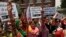 Members of the All India Democratic Women's Association (AIDWA) shout slogans during a protest against the gang rape of two teenage girls, in New Delhi, India, Saturday, May 31, 2014.