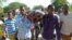 Mourners carry the body of Somali journalist Mohamed Mohamud who was killed after being shot six times by gunmen, Oct. 27, 2013. 
