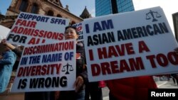 FILE - Supporters attend the "Rally for the American Dream - Equal Education Rights for All," ahead of the start of the trial in a lawsuit accusing Harvard University of discriminating against Asian-American applicants, in Boston, Massachusetts, Oct. 14, 2018.
