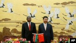 Kenyan President Uhuru Kenyatta, left, and his Chinese counterpart Xi Jinping