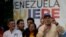 FILE - Opposition spokesman Jesus Torrealba (R) speaks during a campaign rally in Caracas, Venezuela, Nov. 13, 2015.