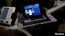 A ballot scanner is seen inside the Allegheny County Elections Warehouse during a media tour in Pittsburgh, Pennsylvania, Oct. 30, 2024.