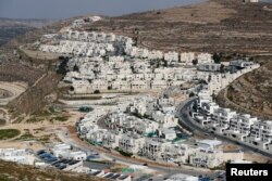 A view shows Israeli settlement buildings around Givat Zeev and Ramat Givat Zeev in the Israeli-occupied West Bank, near Jerusalem, June 30, 2020.