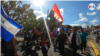 ARCHIVO - Simpatizantes del gobierno del presidente Daniel Ortega en una marcha en Managua, Nicaragua. [Foto de Houston Castillo, VOA]