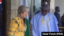 Theresa May, première ministre britannique et le président nigérian Muhammadu Buhari le 29 août 2018.