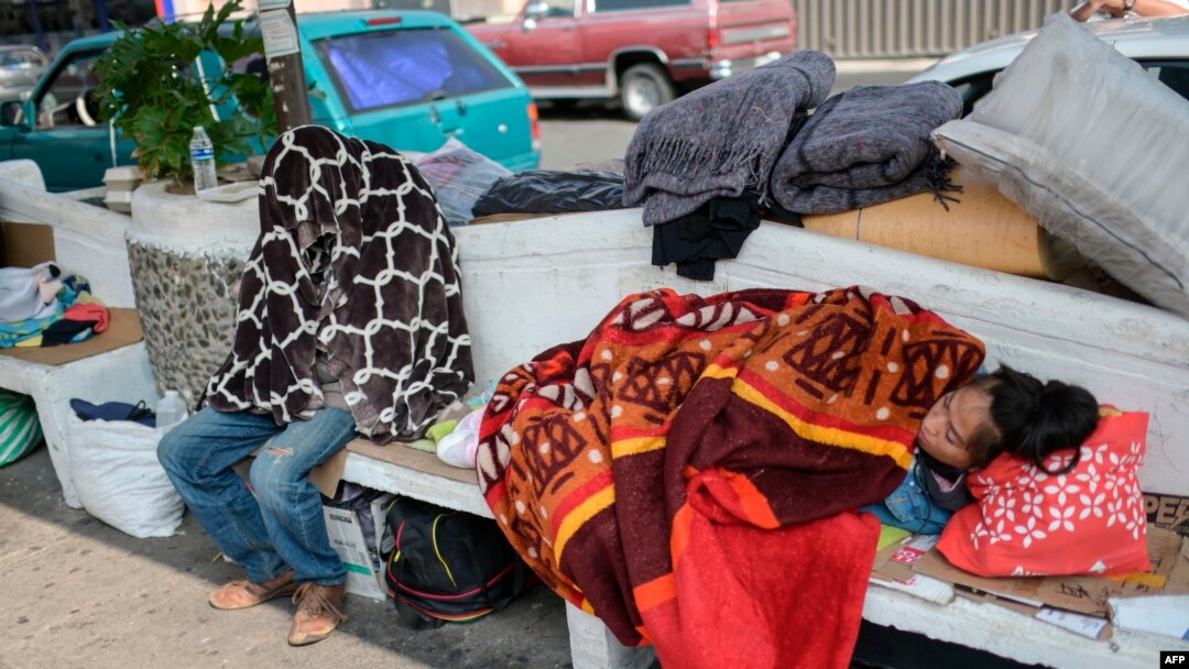 Relatives of patients remain outside the General Hospital in Mexico City on May 9, 2020, amid the COVID-19 pandemic. 