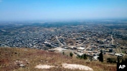 Photo released July 17, 2018 by the Syrian official news agency SANA shows a general view of Tell al-Haara, from the highest hill in the southwestern Daraa province, Syria.