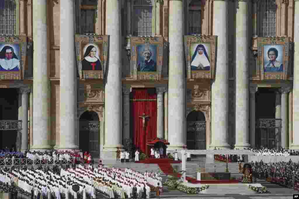 Pope Francis presides over a canonization Mass to (from left) Dulce Lopes Pontes, Giuseppina Vannini, John Henry Newman, Maria Teresa Chiramel Mankidiyan, and Margarita Bays, at the Vatican.