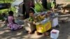 Vendors have remained in the streets of Harare, despite a lockdown asking everyone to stay home as part of efforts to contain the coronavirus in Zimbabwe. (Columbus Mavhunga/VOA)