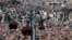 Cable cars travel over La Paz, Bolivia, July 23, 2015. Bolivia has the largest urban cable car system in the world.