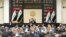 FILE - Iraqi lawmakers attend a parliamentary session to vote on the federal budget at the parliament headquarters in Baghdad, Iraq, June 11, 2023.