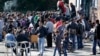 Orderly German Welcome Masks Chaos for Refugees