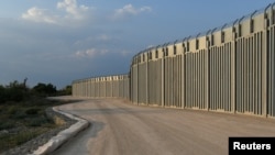 FILE - View of a border fence between Greece and Turkey, in Alexandroupolis, Greece, Aug. 10, 2021. 