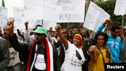 FILE - People protest against an earlier security force attack on a student rally in Oromo during a demonstration organized by the opposition Ethiopian Federal Democratic Unity Forum, in Addis Ababa, May 2014. 