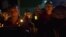 Tibetan exiles participate in a candlelit vigil in Dharmsala, India, Sunday, Sept. 30, 2012.
