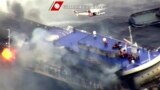 The car ferry Norman Atlantic burns in waters off Greece in this handout video grab of the Italian Coast Guard, December 28, 2014.