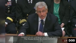 U.S. Defense Secretary Chuck Hagel testifies on Capitol Hill about the Taliban prisoner swap, June 11, 2014.