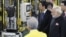 Indian Prime Minister Narendra Modi and Japan's Prime Minister Shinzo Abe inspect Fanuc Corp's factory in Oshino village, Yamanashi Prefecture, Japan in this photo taken by Kyodo, Oct. 28, 2018. 