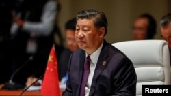 FILE - Chinese President Xi Jinping attends the plenary session of the 2023 BRICS Summit at the Sandton Convention Centre in Johannesburg, South Africa on August 23, 2023. 