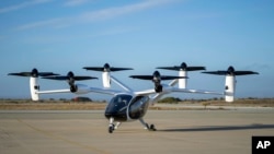 FILE - In this 2022 photo provided by Joby Aviation is Joby’s pre-production prototype aircraft at the company’s flight test facility in Marina, Calif.(Eric Adams/Joby Aviation via AP)