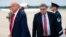 FILE - President Donald Trump and Attorney General William Barr arrive at Andrews Air Force Base, Maryland, Sept. 1, 2020.