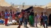 Escapees from Besieged Fallujah Get Emergency Aid