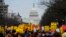 With the White House in the background, antiwar activists march in Washington, Jan. 4, 2020, to protest the U.S. drone attack that killed Iran's Qassem Soleimani in Iraq.
