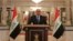FILE - Iraq's Prime Minister-designate Haider al-Abadi speaks during a news conference in Baghdad.