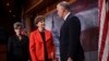 Sen. Jeanne Shaheen, D-N.H., center, and Sen. Joni Ernst, R-Iowa, left, talk with Sen. Thom Tillis, R-N.C., right, on Capitol Hill in Washington, Feb. 7, 2018,