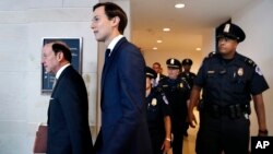 White House senior adviser Jared Kushner, center, and his attorney Abbe Lowell, left, arrive on Capitol Hill in Washington, July 25, 2017, to be questioned by the House Intelligence Committee. 