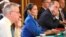 FILE - Britain's Home Secretary Priti Patel, center, attends a Cabinet meeting of senior government ministers at the Foreign and Commonwealth Office in London, Sept. 1, 2020.