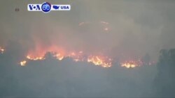 VOA60 America - California Wildfires Kill 11, Burn 1,500 Buildings