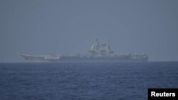 Chinese aircraft carrier Shandong sails in Pacific Ocean waters, south of Okinawa prefecture, Japan