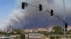 California Blazes Under Control, Suspect Held